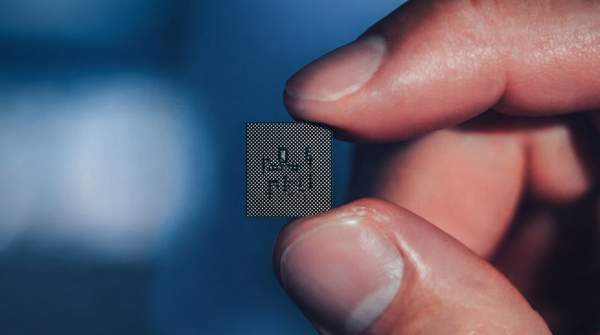 Editorial illustration for Inside a Snapdragon Chip: How Qualcomm Divides a Smartphone's Work Among Specialists