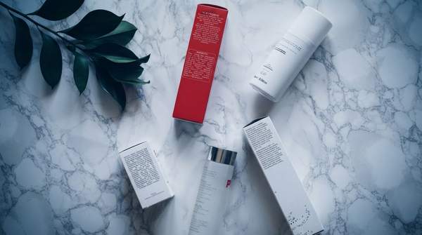 Editorial illustration for Natural, Clean, and Non-Toxic Mean Almost Nothing on a Beauty Label — Here's What Actually Does
